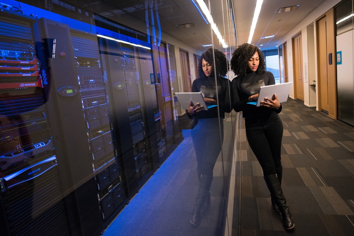 An engineer reviewing systems in a data center